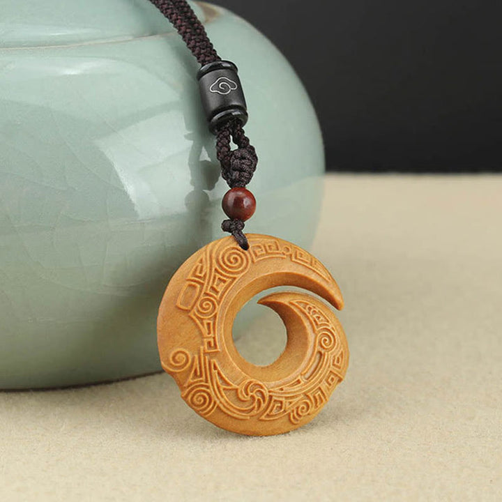 Buddha Stones d'ébène Bois de santal La chance améliore le motif de conception Collier pendentif de paix