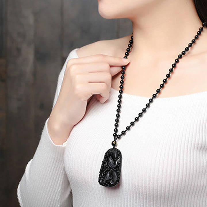 Collier avec pendentif en perles de force gravées en obsidienne noire et poisson Koi de Buddha Stones - image 18