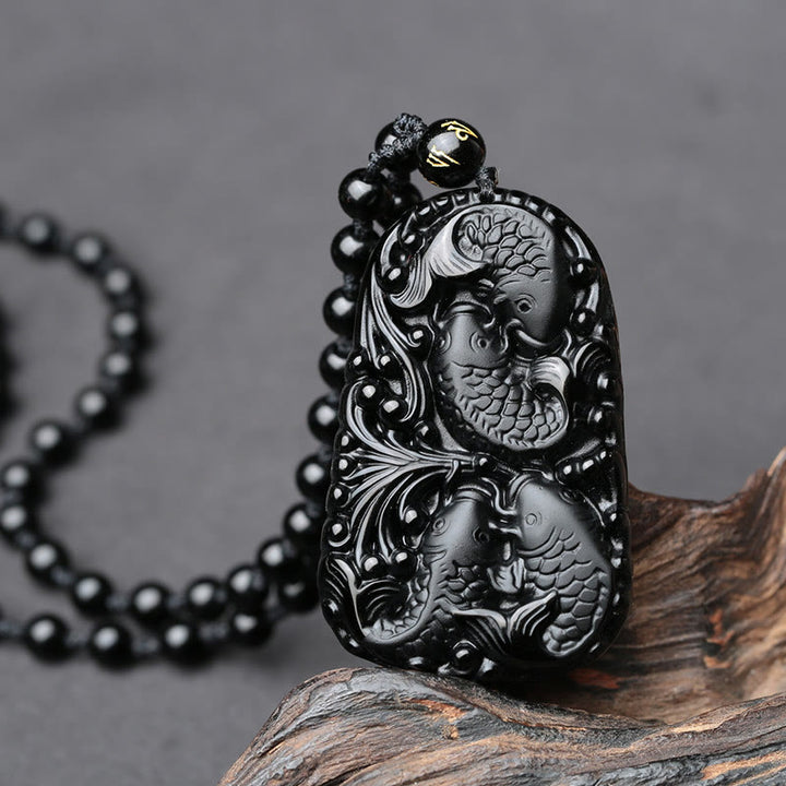 Collier avec pendentif en perles de force gravées en obsidienne noire et poisson Koi de Buddha Stones - image 9