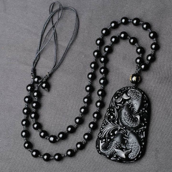 Collier avec pendentif en perles de force gravées en obsidienne noire et poisson Koi de Buddha Stones - image 10
