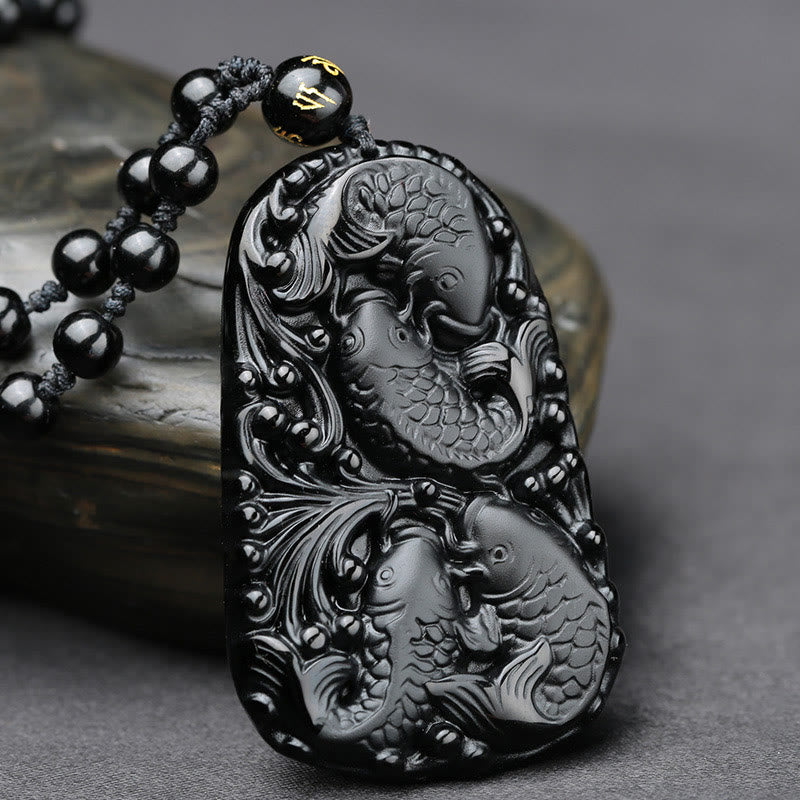 Collier avec pendentif en perles de force gravées en obsidienne noire et poisson Koi de Buddha Stones - image 2