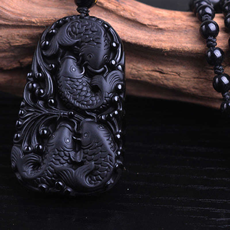Collier avec pendentif en perles de force gravées en obsidienne noire et poisson Koi de Buddha Stones - image 14
