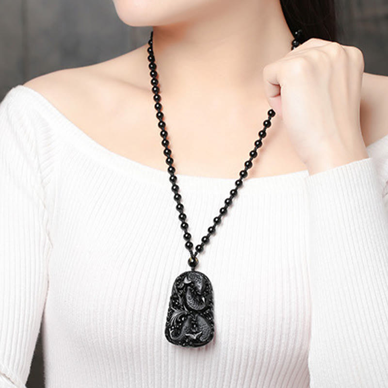 Collier avec pendentif en perles de force gravées en obsidienne noire et poisson Koi de Buddha Stones - image 21