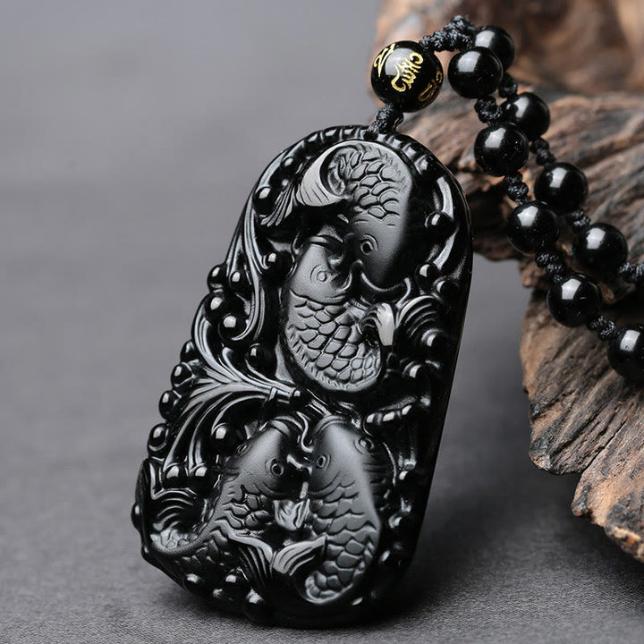 Collier avec pendentif en perles de force gravées en obsidienne noire et poisson Koi de Buddha Stones - image 3