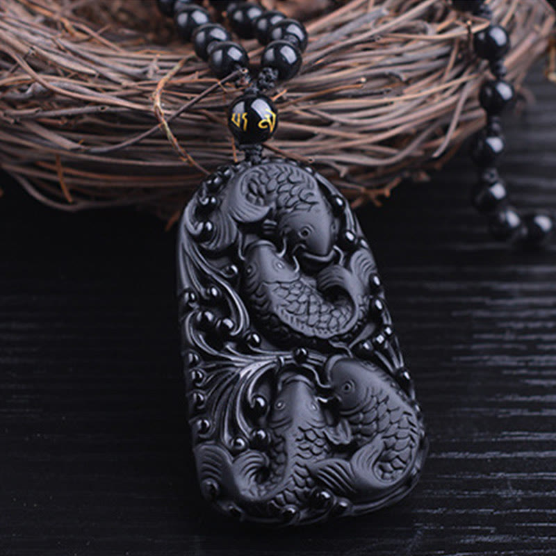 Collier avec pendentif en perles de force gravées en obsidienne noire et poisson Koi de Buddha Stones - image 12