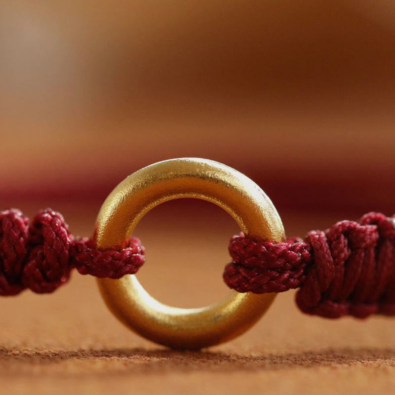 Bracelet en fil rouge avec boucle de paix et Buddha Stones