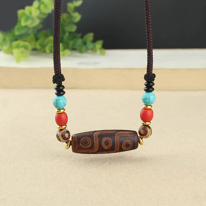 Buddha Stones Perle Dzi tibétaine à neuf yeux Perle Dzi à trois yeux Colliers de protection Pendentif