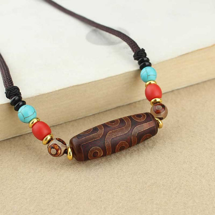 Buddha Stones Perle Dzi tibétaine à neuf yeux Perle Dzi à trois yeux Colliers de protection Pendentif