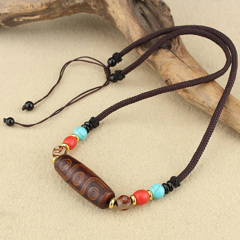 Buddha Stones Perle Dzi tibétaine à neuf yeux Perle Dzi à trois yeux Colliers de protection Pendentif