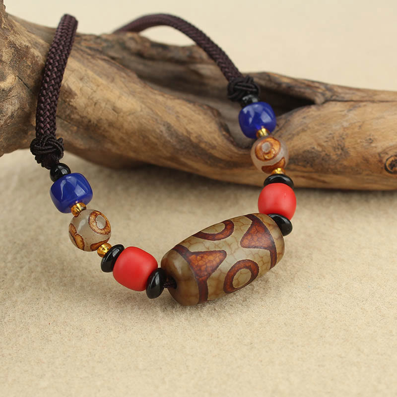 Buddha Stones Perle Dzi tibétaine à neuf yeux Perle Dzi à trois yeux Colliers de protection Pendentif