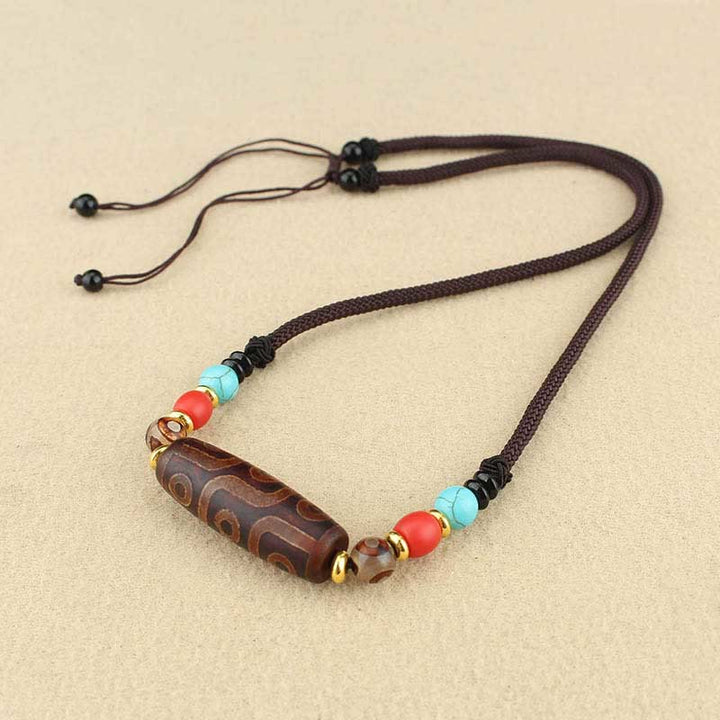 Buddha Stones Perle Dzi tibétaine à neuf yeux Perle Dzi à trois yeux Colliers de protection Pendentif