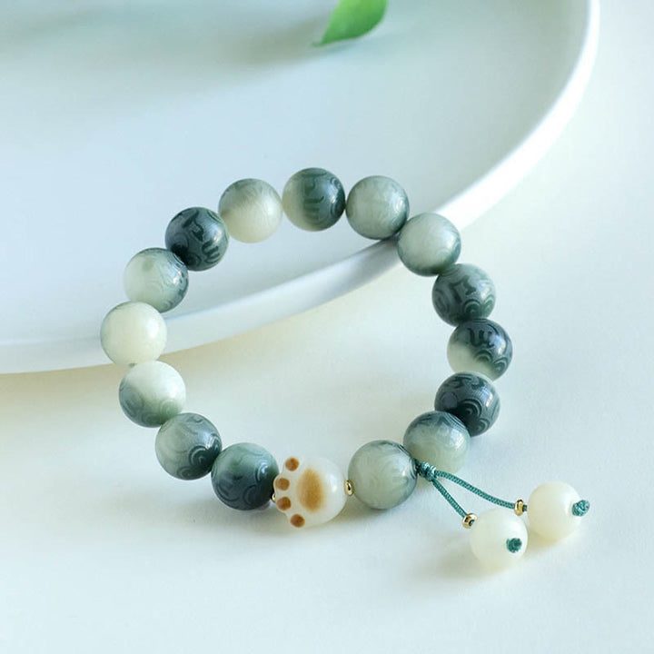 Bracelet d'harmonie sculpté en Buddha Stones Bodhi Seed Om Mani Padme Hum