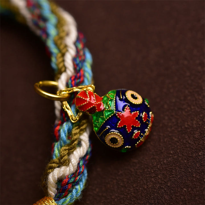 Bracelet tressé fait main en Buddha Stones avec nœud de réincarnation et de guérison de la famille des bêtes avaleuses