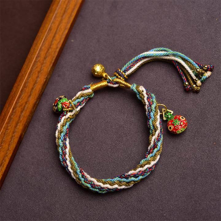 Bracelet tressé fait main en Buddha Stones avec nœud de réincarnation et de guérison de la famille des bêtes avaleuses