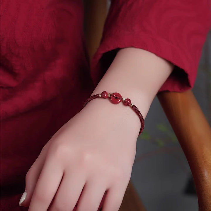 Bracelet en corde tressée fait main avec boucle de paix en Buddha Stones et lotus calme et bénédiction