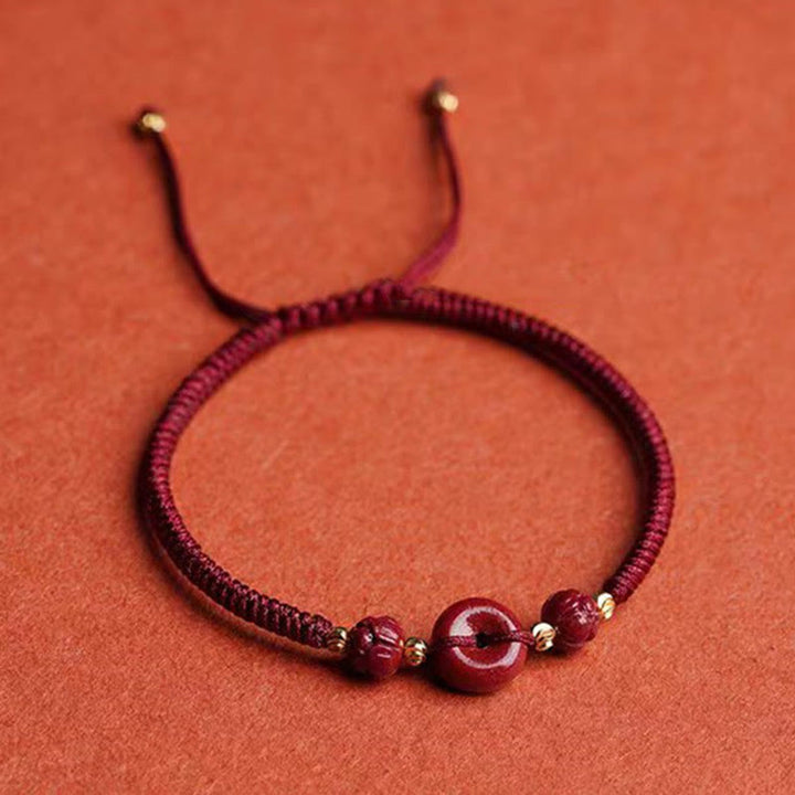 Bracelet en corde tressée fait main avec boucle de paix en Buddha Stones et lotus calme et bénédiction