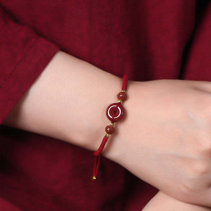 Bracelet en corde tressée fait main avec boucle de paix en Buddha Stones et lotus calme et bénédiction