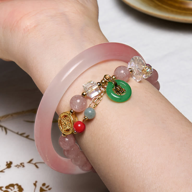 Bracelet rose avec Buddha Stones attirant l'amour et la protection