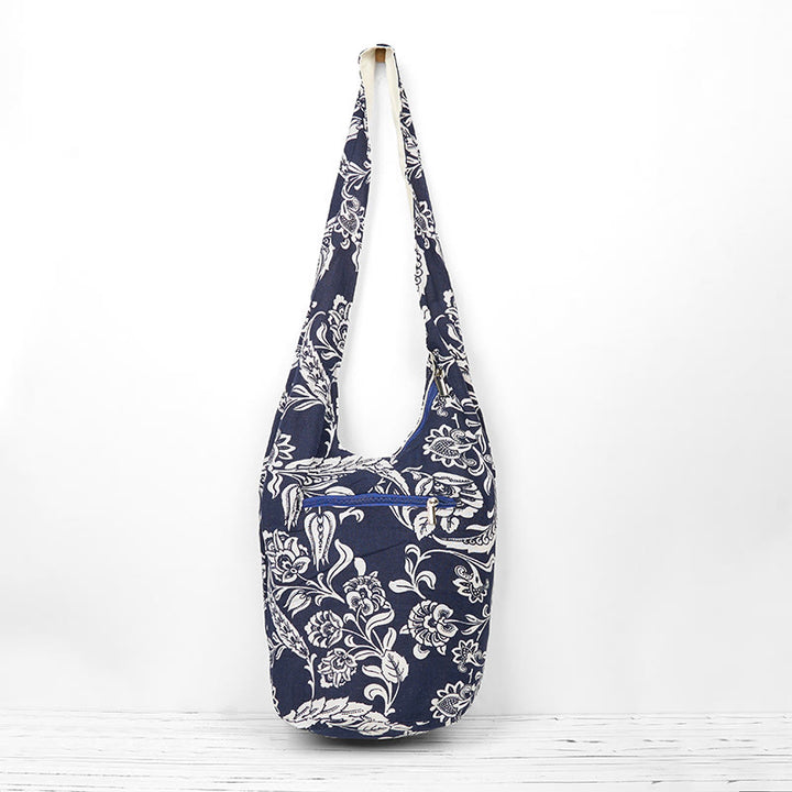 Sac à bandoulière en coton à motif de fleurs bleu marine et blanc Buddha Stones