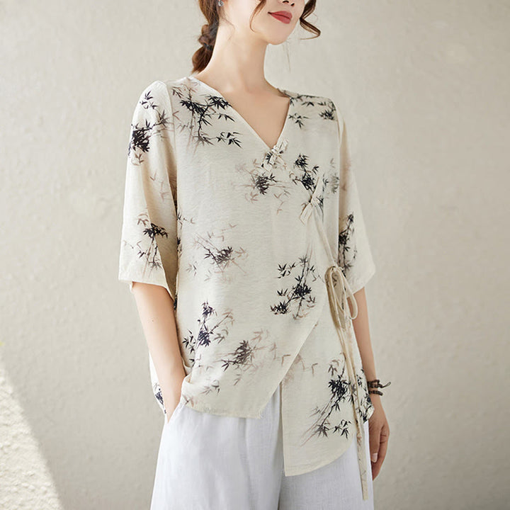 T-shirt à lacets et boutons en forme de grenouille avec imprimé feuilles de bambou et Buddha Stones