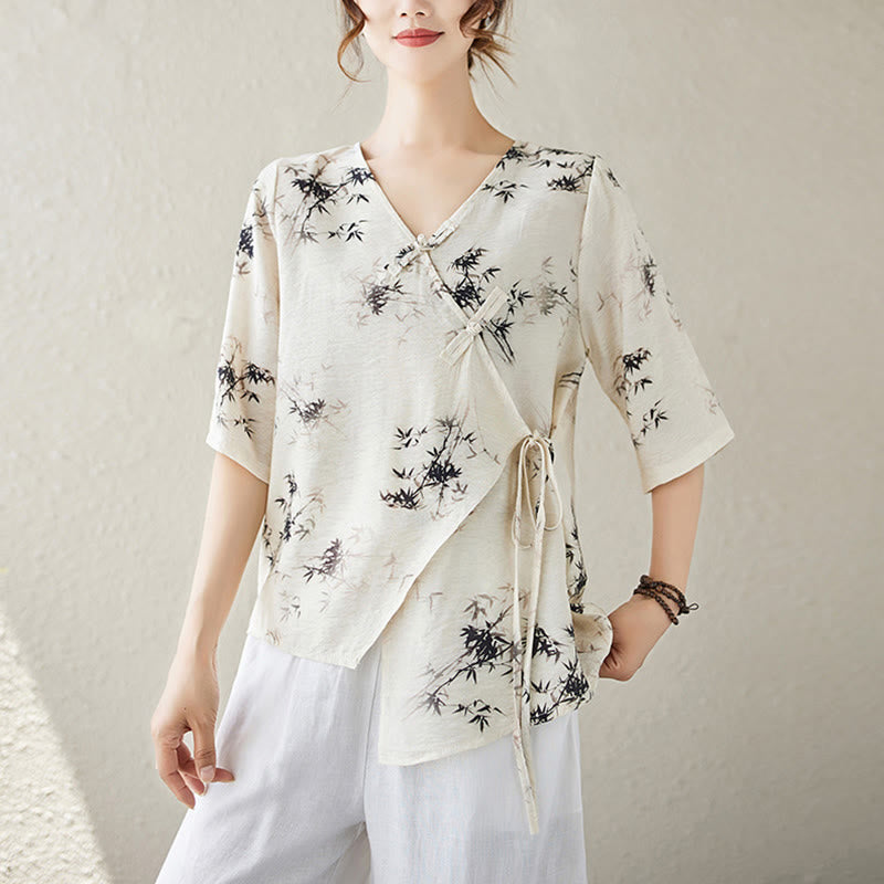 T-shirt à lacets et boutons en forme de grenouille avec imprimé feuilles de bambou et Buddha Stones