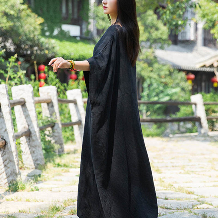 Robe longue ample à manches chauve-souris et poches de couleur unie avec Buddha Stones