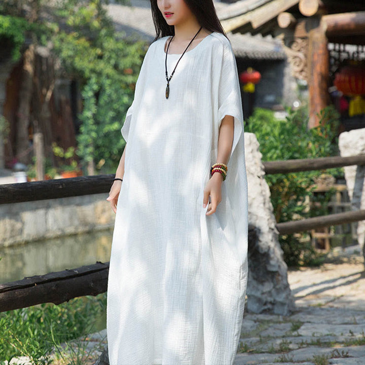 Robe longue ample à manches chauve-souris et poches de couleur unie avec Buddha Stones