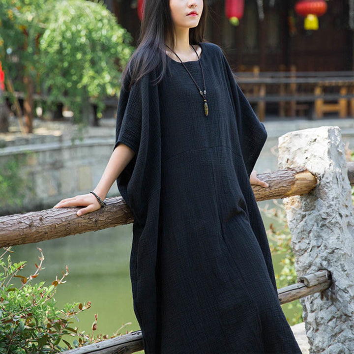 Robe longue ample à manches chauve-souris et poches de couleur unie avec Buddha Stones