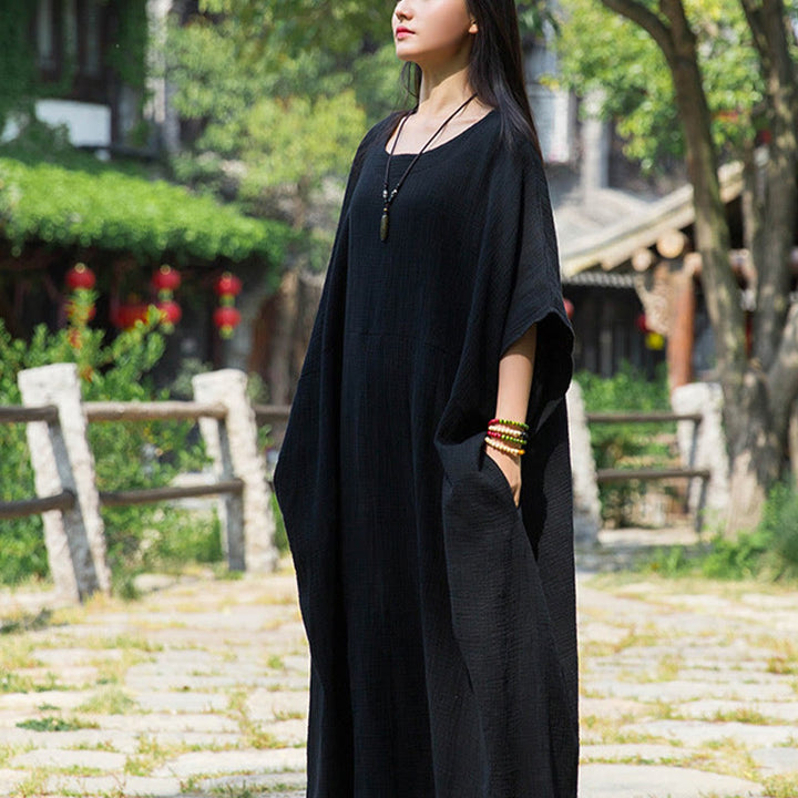 Robe longue ample à manches chauve-souris et poches de couleur unie avec Buddha Stones