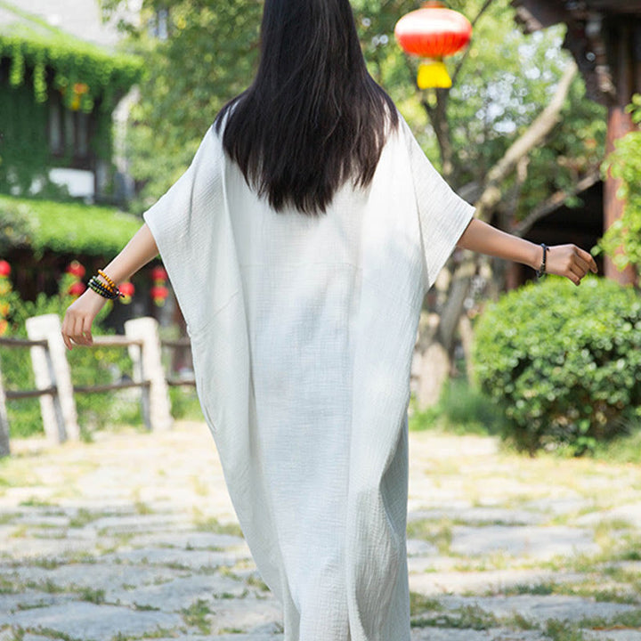 Robe longue ample à manches chauve-souris et poches de couleur unie avec Buddha Stones