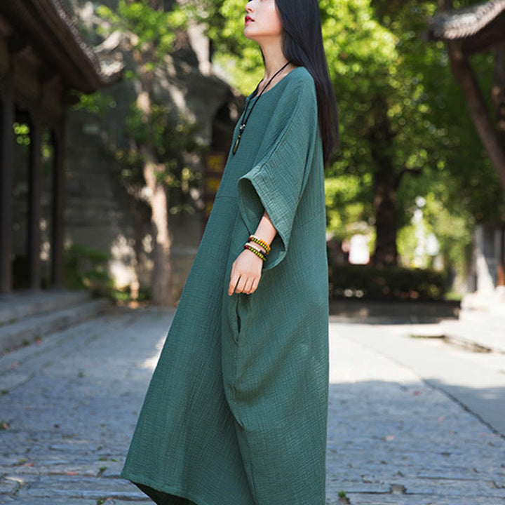 Robe longue ample à manches chauve-souris et poches de couleur unie avec Buddha Stones