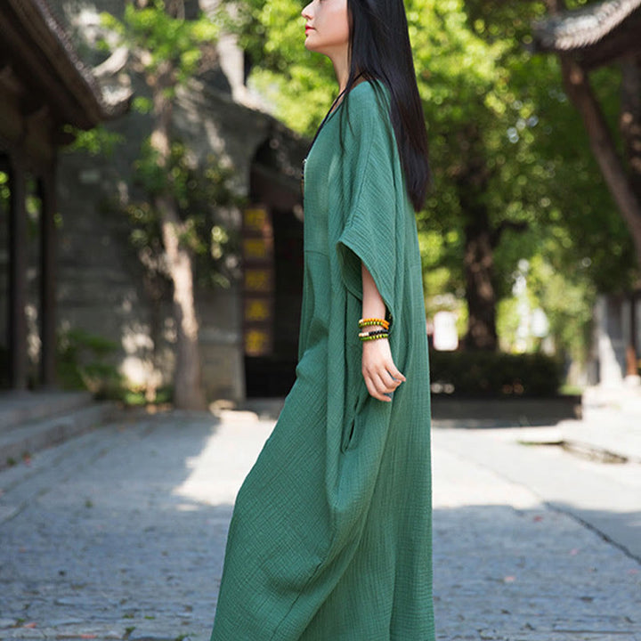 Robe longue ample à manches chauve-souris et poches de couleur unie avec Buddha Stones