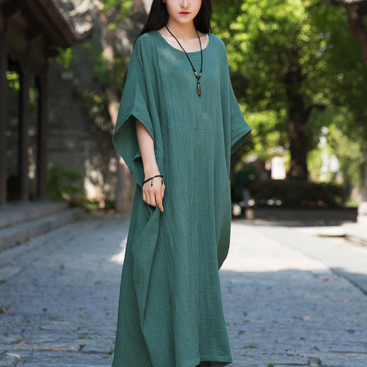 Robe longue ample à manches chauve-souris et poches de couleur unie avec Buddha Stones
