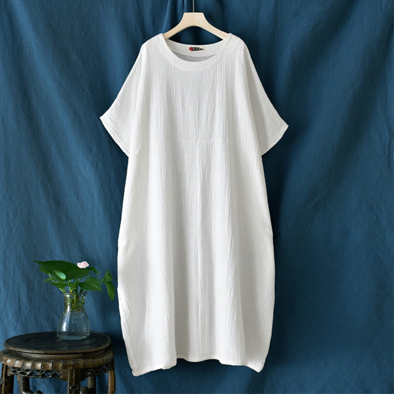 Robe longue ample à manches chauve-souris et poches de couleur unie avec Buddha Stones