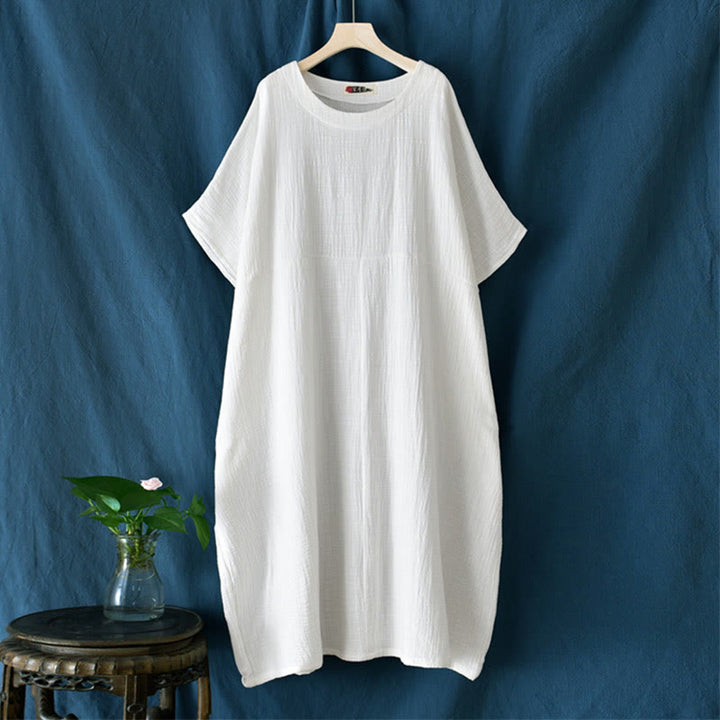 Robe longue ample à manches chauve-souris et poches de couleur unie avec Buddha Stones