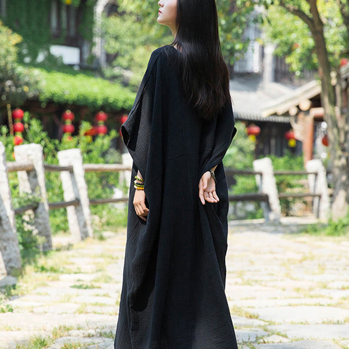 Robe longue ample à manches chauve-souris et poches de couleur unie avec Buddha Stones