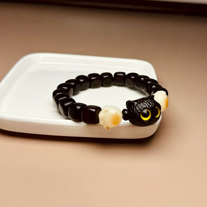 Bracelet de paix en forme de patte de chat mignon en bois d'ébène avec Buddha Stones et graines de Bodhi - image 9