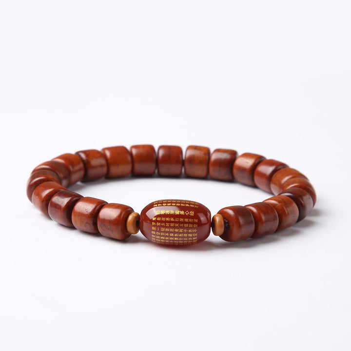 Bracelet de force en agate rouge et corne de mouton avec Buddha Stones d'os tibétaines et perles dzi à trois yeux
