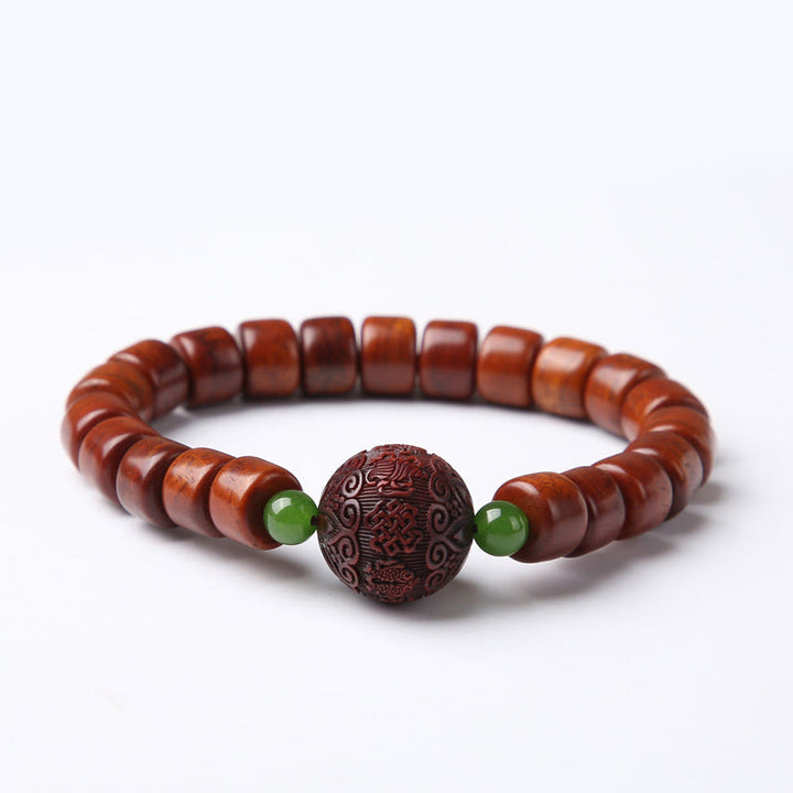 Bracelet de force en agate rouge et corne de mouton avec Buddha Stones d'os tibétaines et perles dzi à trois yeux