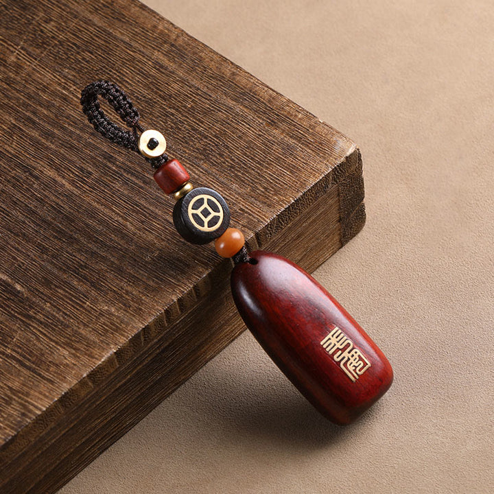 Porte-clés de protection en cuivre avec petites Buddha Stones en bois de santal rouge et bois d'ébène