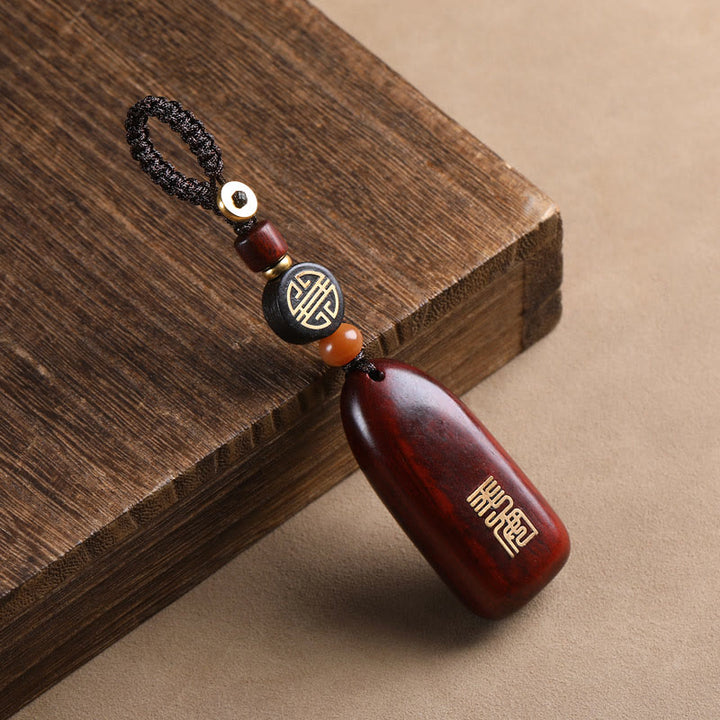 Porte-clés de protection en cuivre avec petites Buddha Stones en bois de santal rouge et bois d'ébène