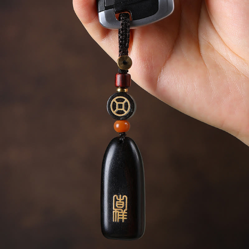 Porte-clés de protection en cuivre avec petites Buddha Stones en bois de santal rouge et bois d'ébène