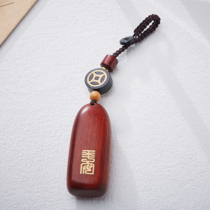 Porte-clés de protection en cuivre avec petites Buddha Stones en bois de santal rouge et bois d'ébène