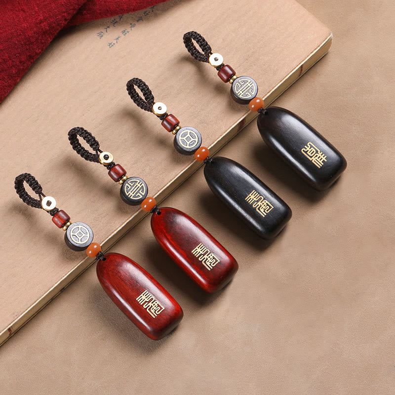 Porte-clés de protection en cuivre avec petites Buddha Stones en bois de santal rouge et bois d'ébène