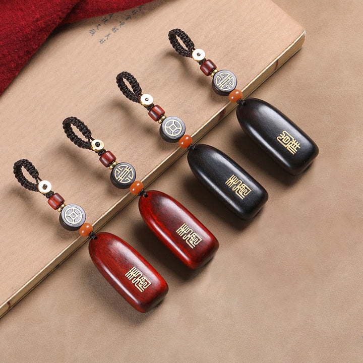 Porte-clés de protection en cuivre avec petites Buddha Stones en bois de santal rouge et bois d'ébène