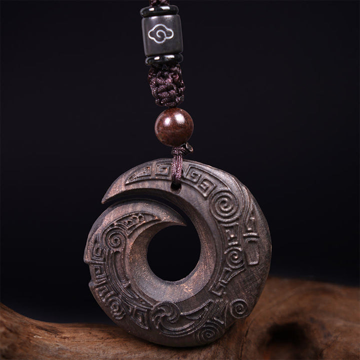 Buddha Stones d'ébène Bois de santal La chance améliore le motif de conception Collier pendentif de paix