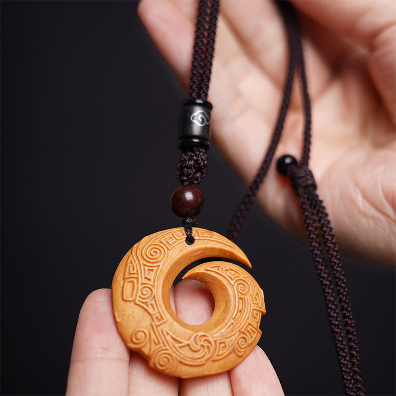 Buddha Stones d'ébène Bois de santal La chance améliore le motif de conception Collier pendentif de paix