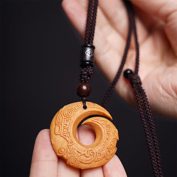 Buddha Stones d'ébène Bois de santal La chance améliore le motif de conception Collier pendentif de paix