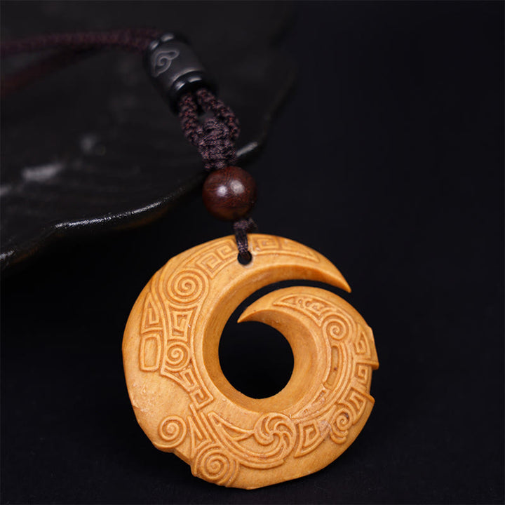 Buddha Stones d'ébène Bois de santal La chance améliore le motif de conception Collier pendentif de paix