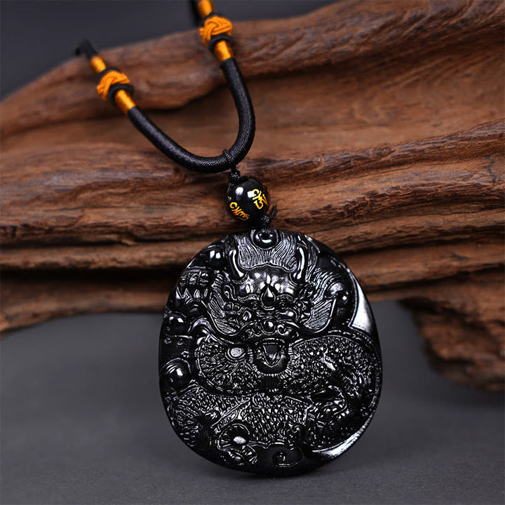 Collier pendentif de protection sculpté en obsidienne noire naturelle en Buddha Stones - Dragon 45 mm x 48 mm - image 1
